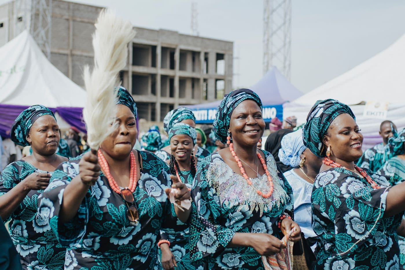 A joyful group of Ugandan women celebrating together